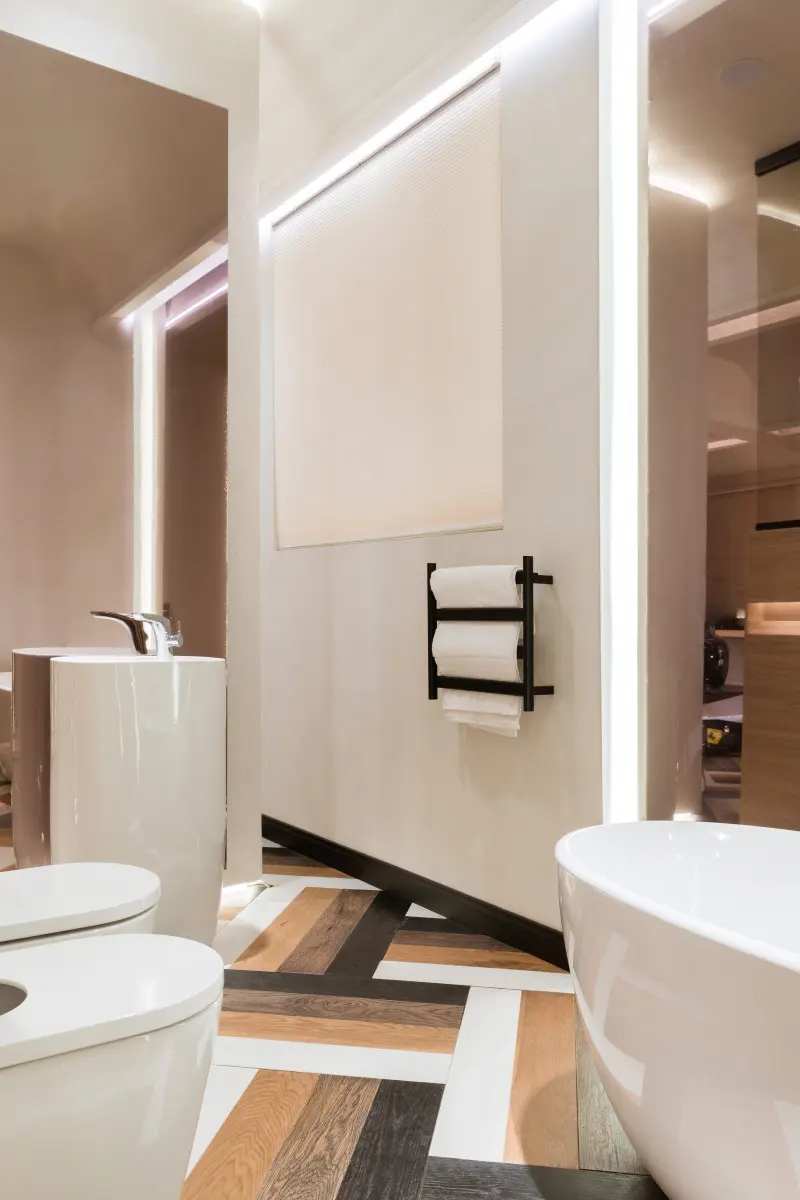 Toalleros eléctricos, toalleros de baño, diseño de baño, eficiencia energética, funcionalidad baño, toalleros de Atrim, toalleros modernos, instalación toalleros, toalleros arquitectos, toalleros para constructoras.